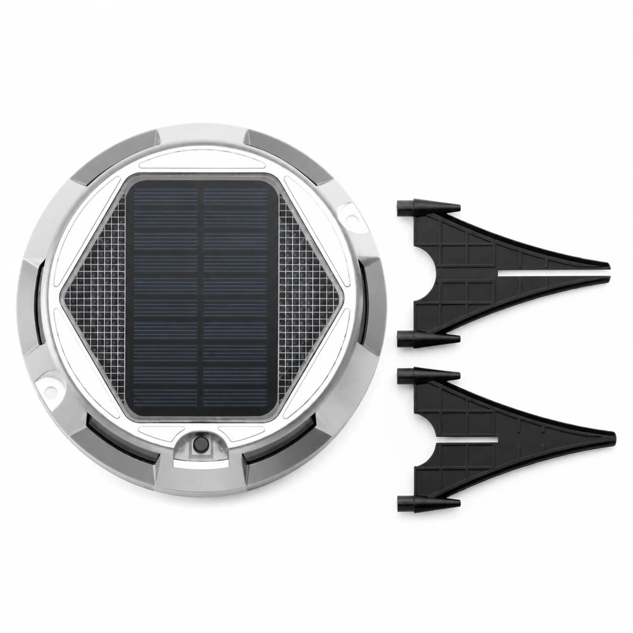 Solar deck light and mounting stakes on a white background