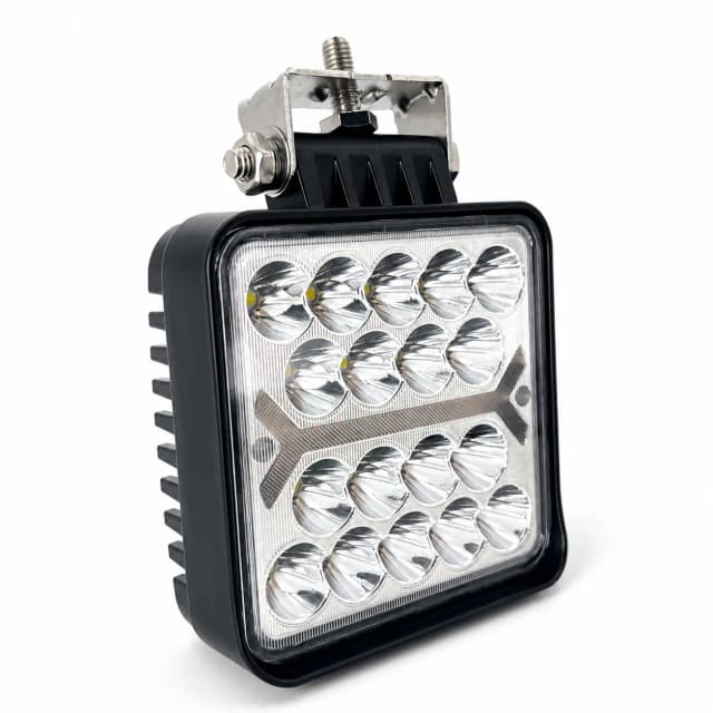Square heavy equipment work light on a clean white background