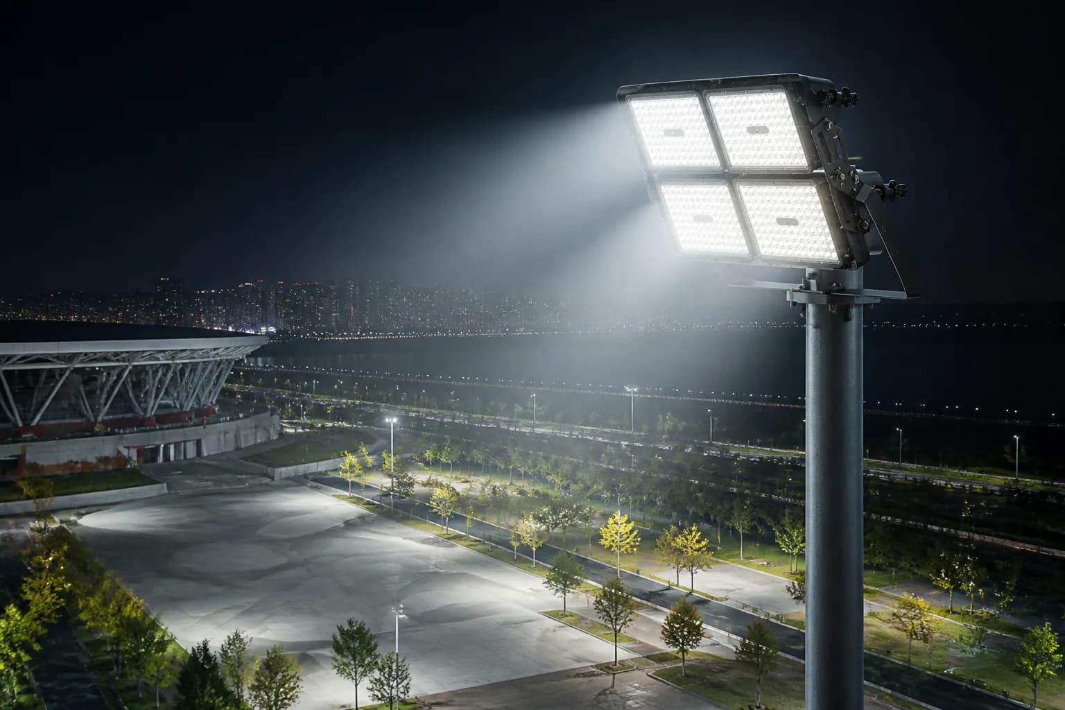 High mast light illuminating a large outdoor area at night