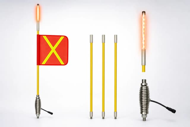 LED lighted mining safety whip flag on a clean studio background