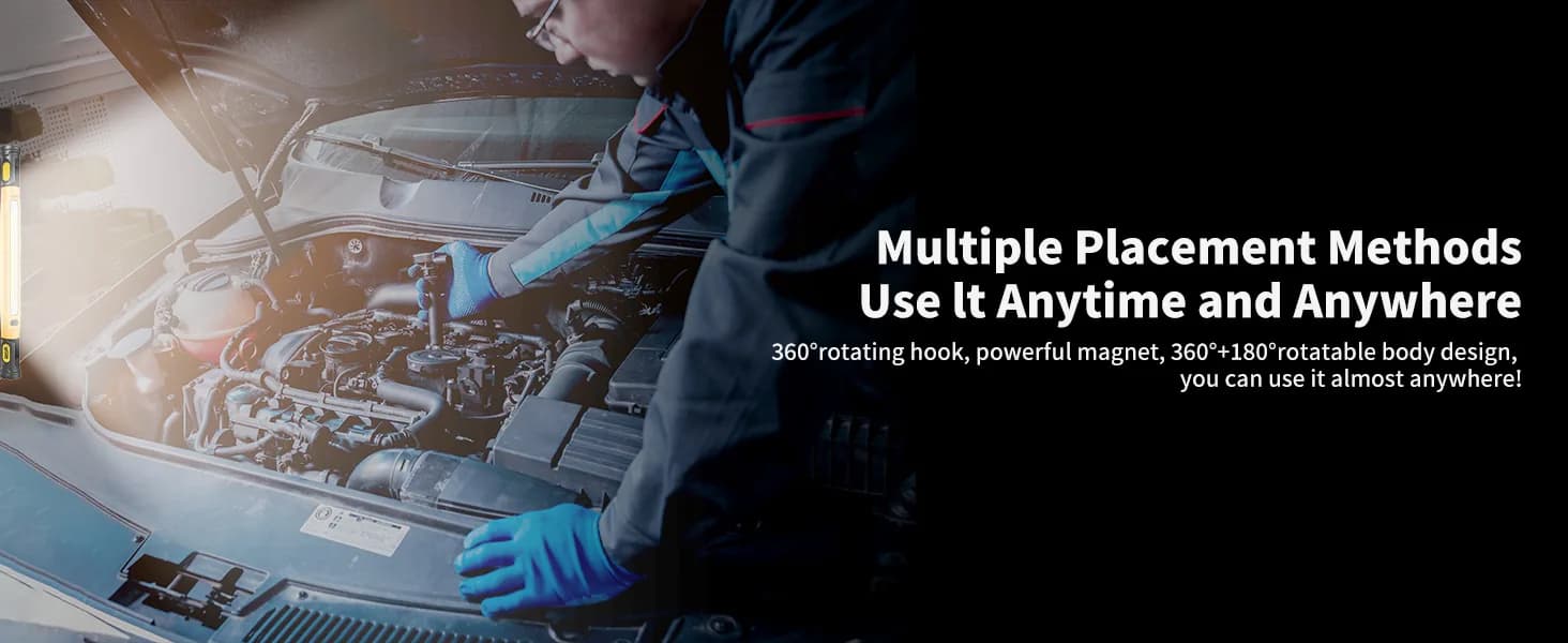 Portable magnetic work light being used during under-hood maintenance