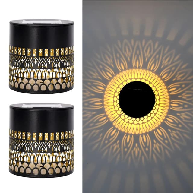 Decorative solar pattern wall light on a clean product background